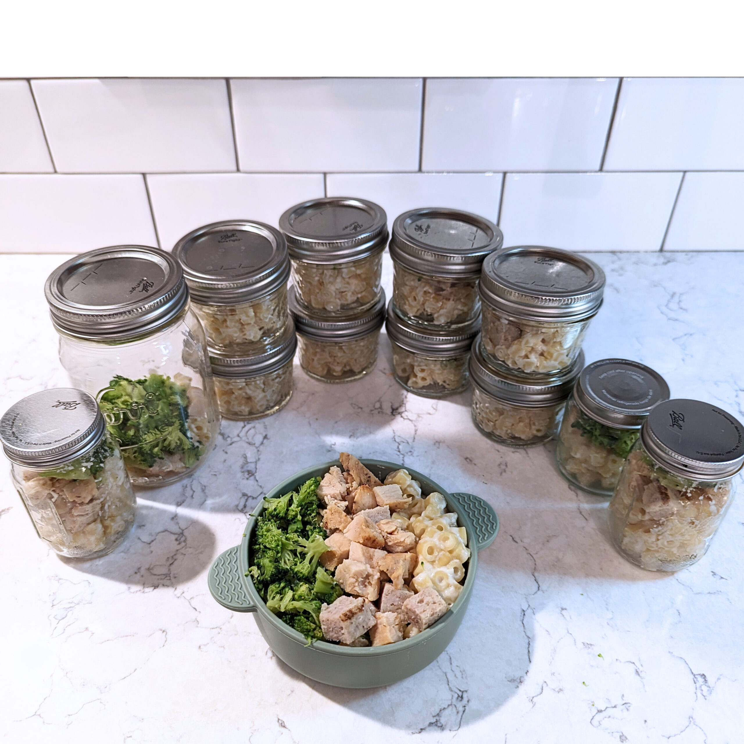 Jars of premade baby led weaning alfredo